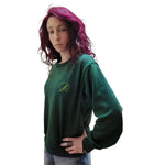 model wearing green crewneck